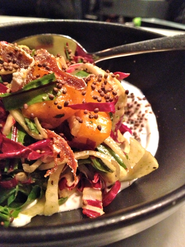 The persimmon salad is full of surprises as a starter. Photo by Christine Willmsen